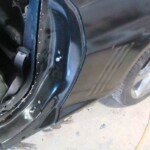 Photographs of a 2014 Chevrolet Camaro that was in an accident and repaired by Elite Paint & Body Shop in West Palm Beach Florida
